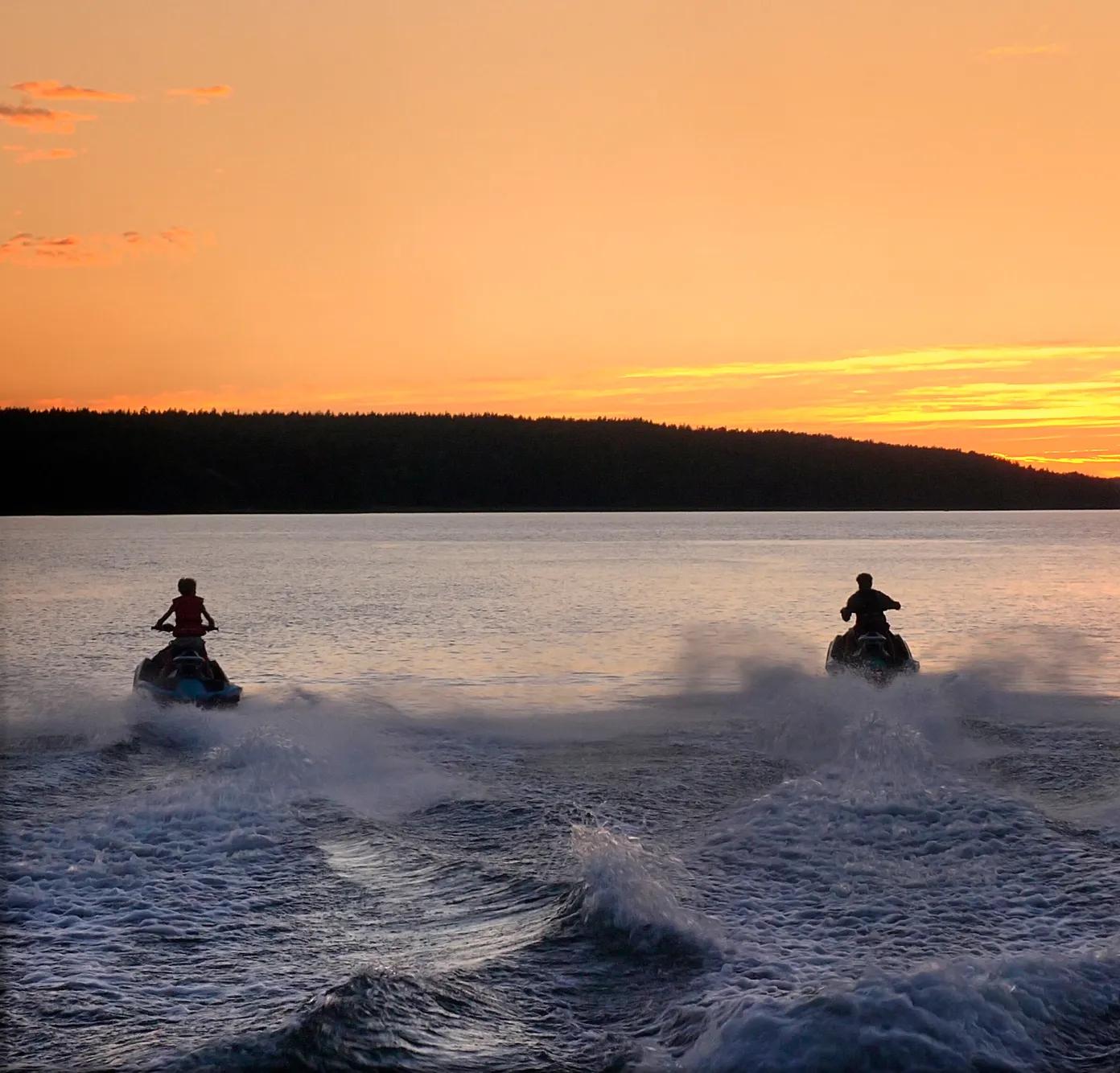 Riding jetski at sunset in Sweden